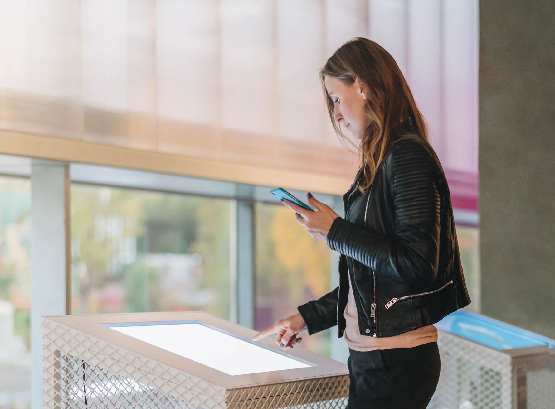 woman using touch screen