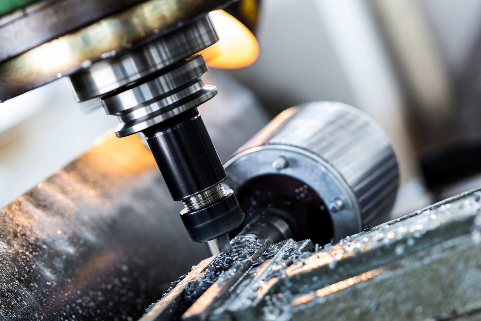 Manufacturing, drilling machine in factory workshop