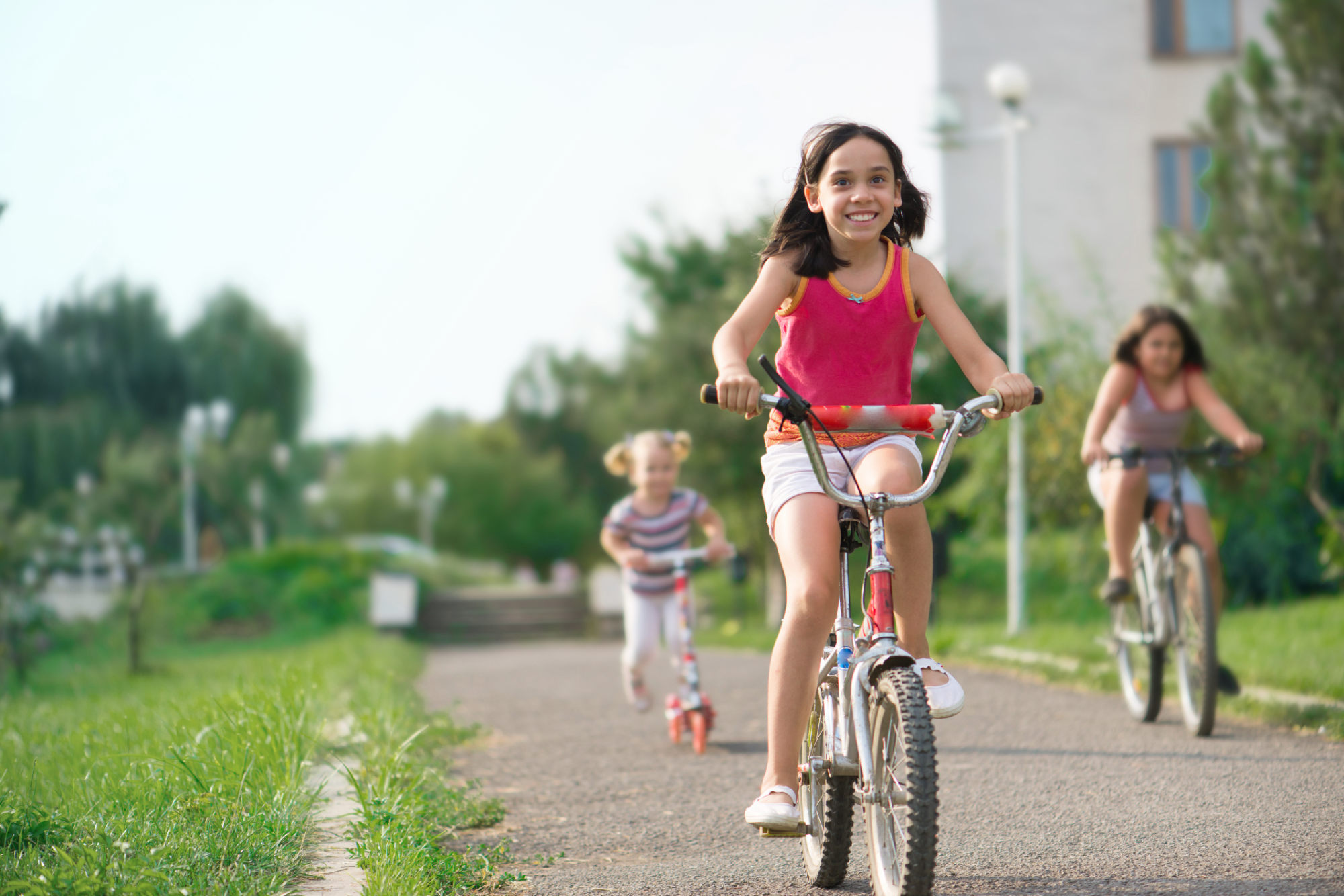 Children on the bikes driving to use proactive government and public services