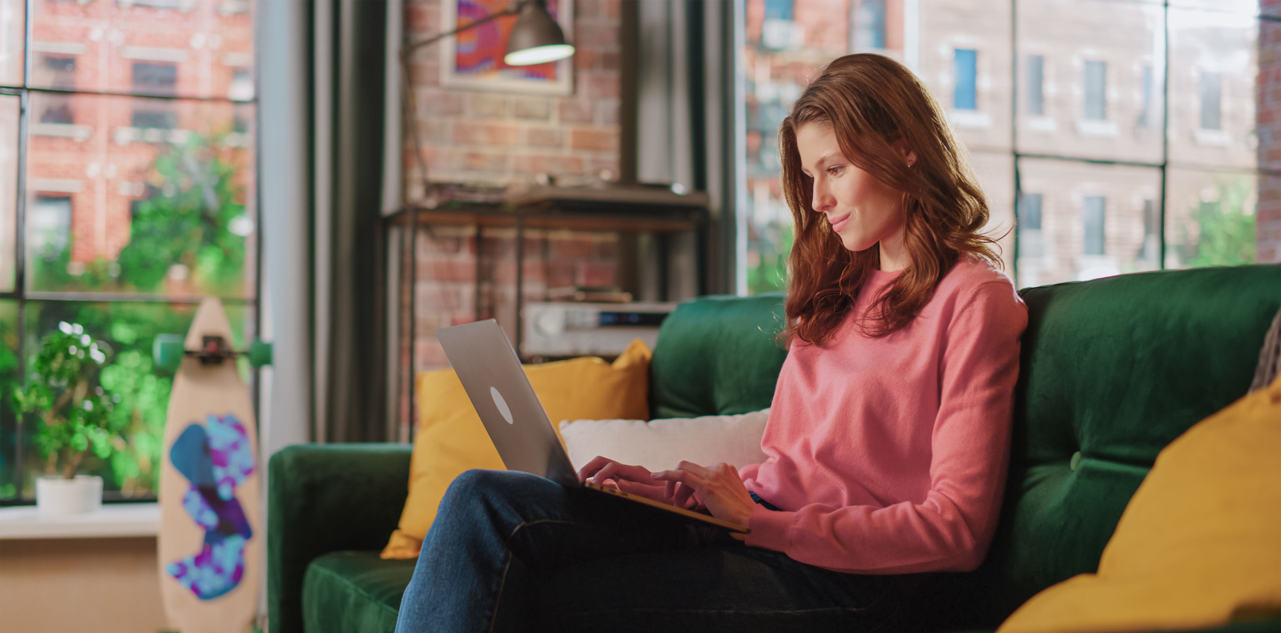 young woman at home using computer