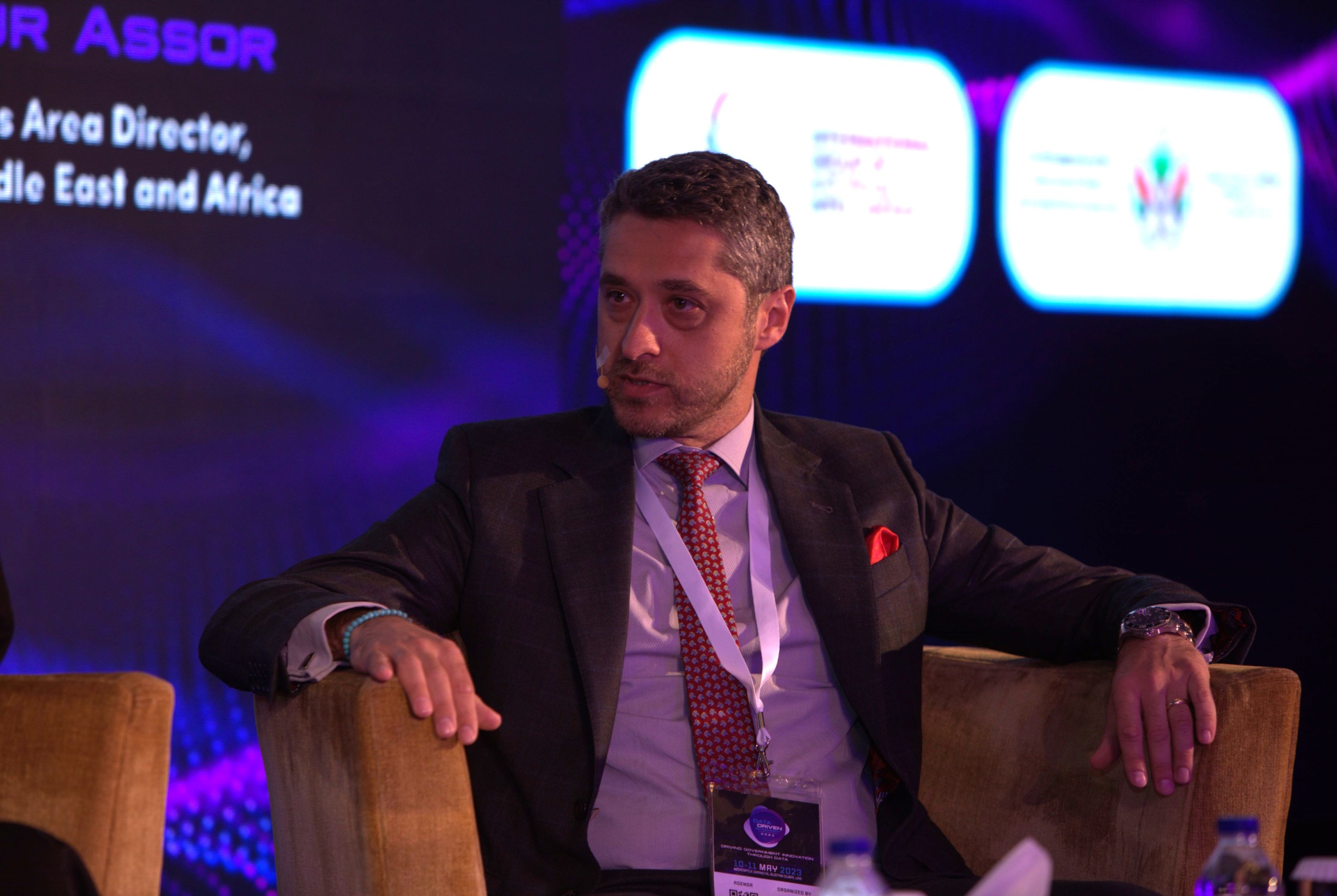 Artur Assor speaking on a panel explaining pportunities and challenges of government data sharing