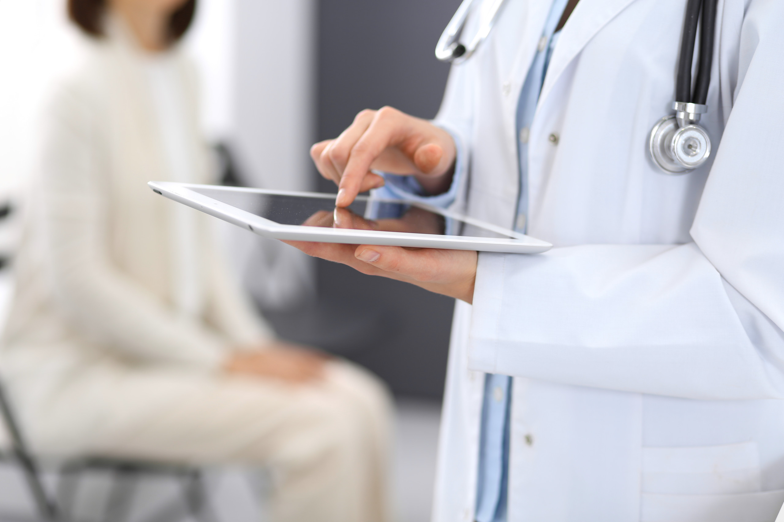 Medical health staff working on Ipad