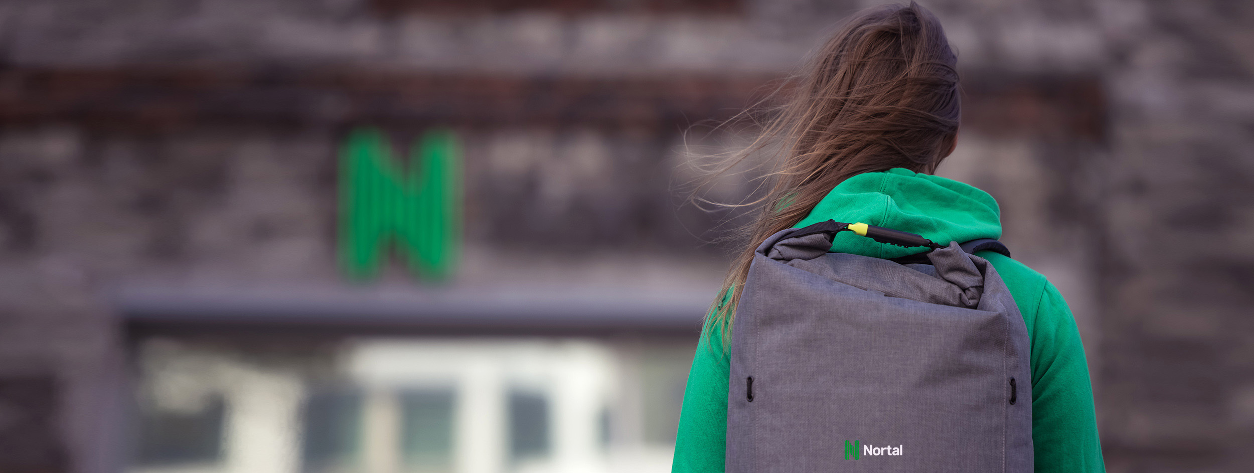 Woman standing in front of Nortal office