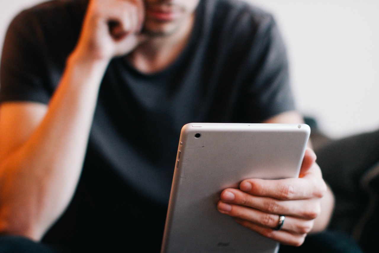 Man holding tablet