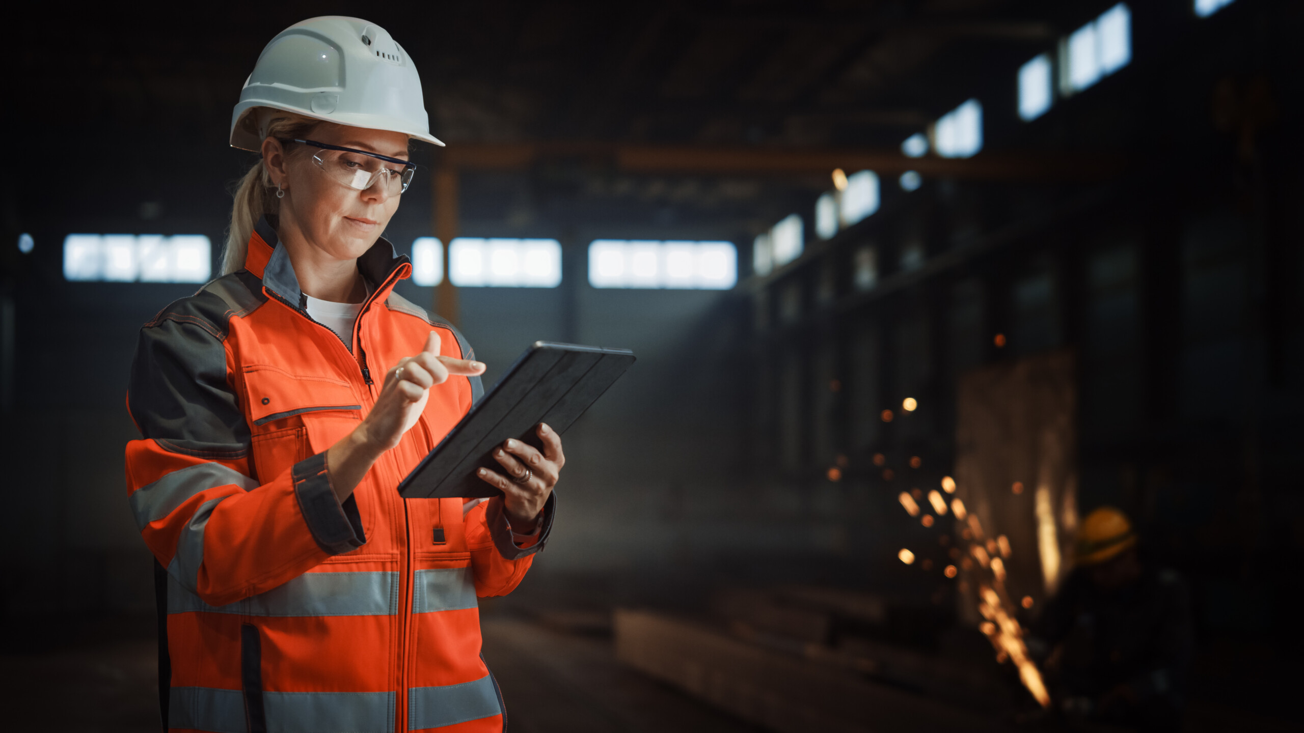 Industry employee using tablet