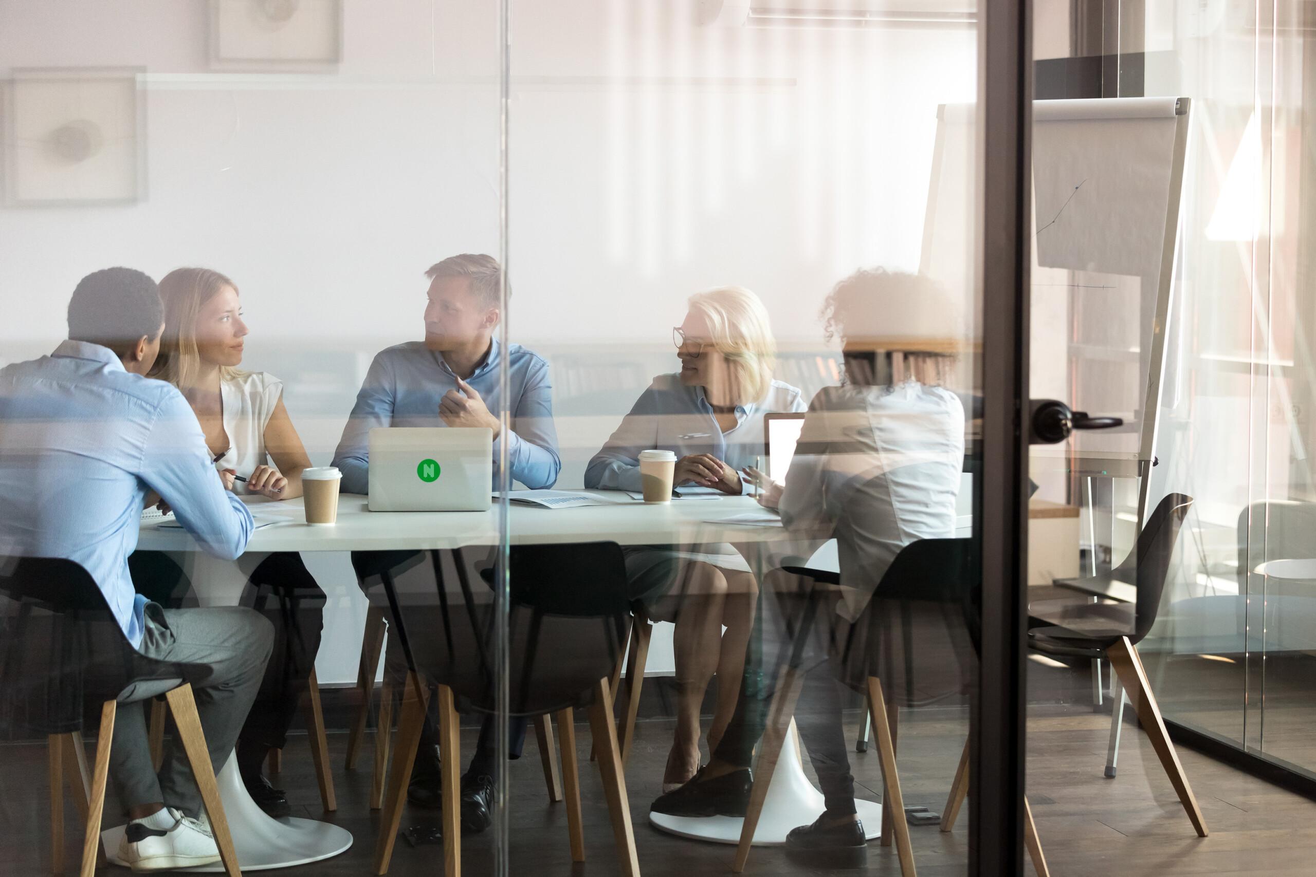 Team sitting together in the office