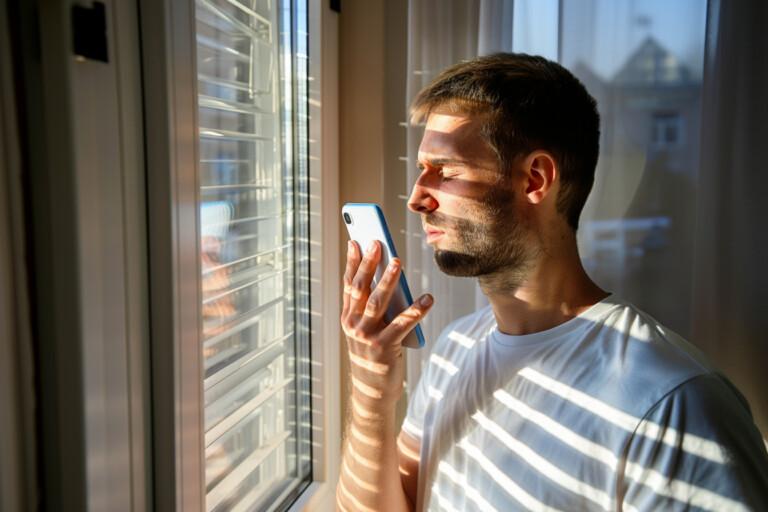 Blind man talking to a phone
